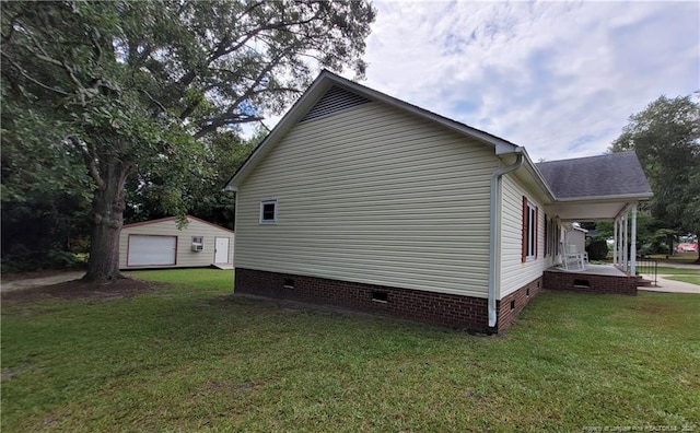 2508 N Roberts Ave N, Lumberton, NC 28358 - view of home's exterior featuring crawl space, a porch, a lawn, and an outbuilding