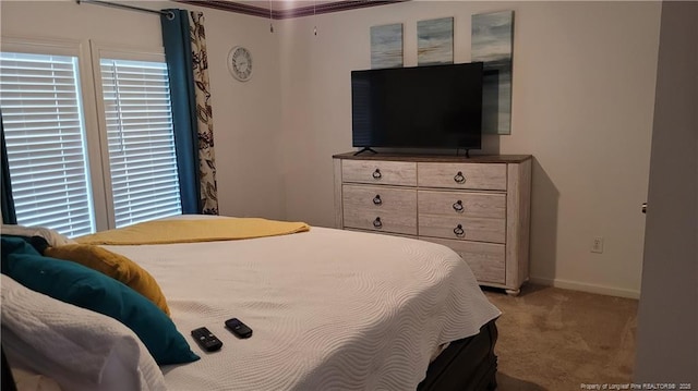2508 N Roberts Ave N, Lumberton, NC 28358 - bedroom with light carpet and baseboards