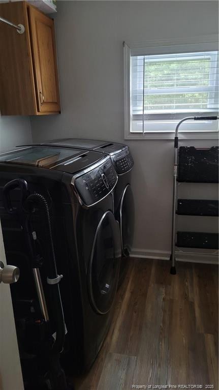 2508 N Roberts Ave N, Lumberton, NC 28358 - washroom featuring separate washer and dryer, dark wood-style floors, and cabinet space