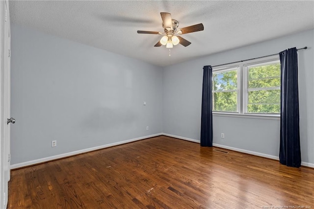 521 Fawn Ct, Fayetteville, NC 28303 - unfurnished room featuring a ceiling fan, wood finished floors, and a textured ceiling