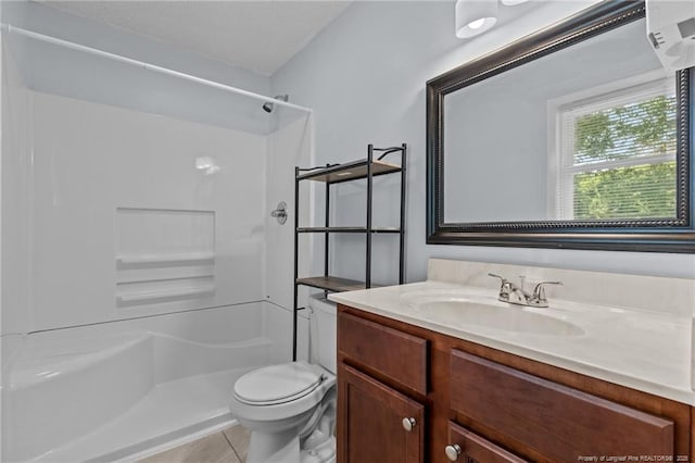 521 Fawn Ct, Fayetteville, NC 28303 - bathroom featuring a shower, vanity, and tile patterned flooring