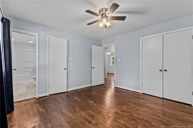 521 Fawn Ct, Fayetteville, NC 28303 - unfurnished bedroom featuring wood finished floors, ensuite bath, and a ceiling fan