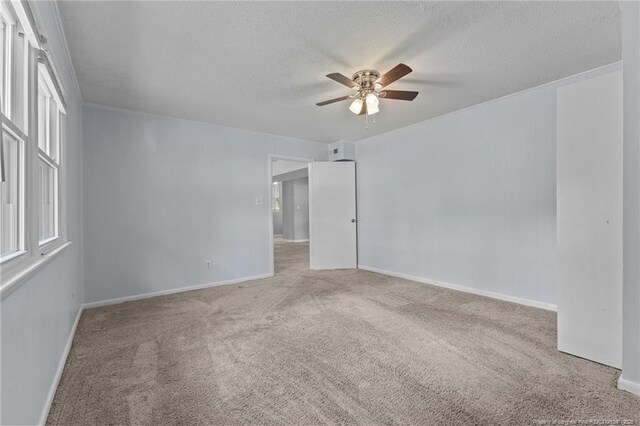 521 Fawn Ct, Fayetteville, NC 28303 - carpeted spare room with ceiling fan and a textured ceiling