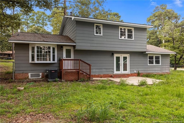 521 Fawn Ct, Fayetteville, NC 28303 - rear view of house with a chimney, french doors, a patio area, and a shingled roof