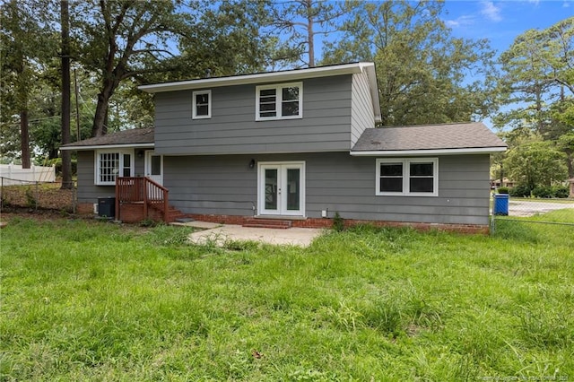 521 Fawn Ct, Fayetteville, NC 28303 - back of house with french doors and roof with shingles