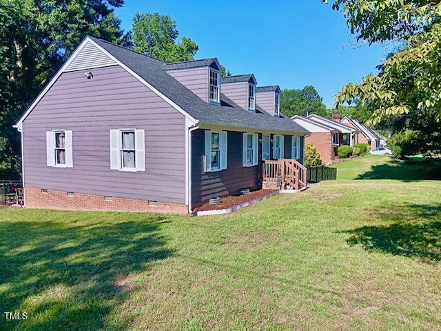 105 Meadow Brook Ln, Oxford, NC 27565 - view of home's exterior featuring crawl space and a lawn