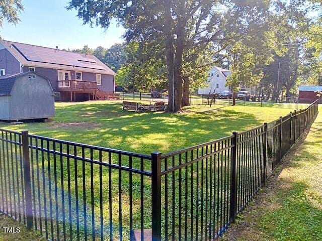 105 Meadow Brook Ln, Oxford, NC 27565 - fenced backyard featuring a storage shed and a deck