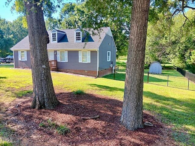 105 Meadow Brook Ln, Oxford, NC 27565 - view of property exterior featuring a storage shed