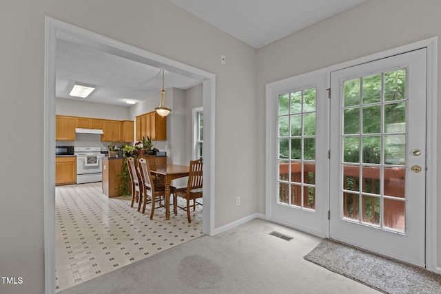 108 Tarlow Ct, Cary, NC 27513 - dining area featuring light carpet and baseboards