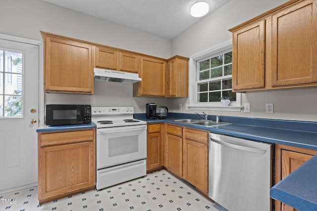 108 Tarlow Ct, Cary, NC 27513 - kitchen with dishwasher, white electric stove, black microwave, under cabinet range hood, and light floors