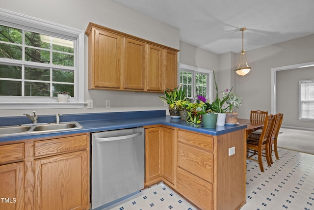 108 Tarlow Ct, Cary, NC 27513 - kitchen featuring dishwasher, a peninsula, decorative light fixtures, and dark countertops
