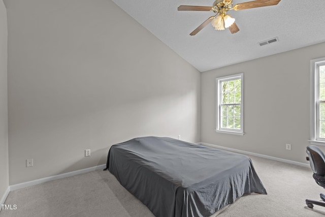 108 Tarlow Ct, Cary, NC 27513 - carpeted bedroom with lofted ceiling and a ceiling fan