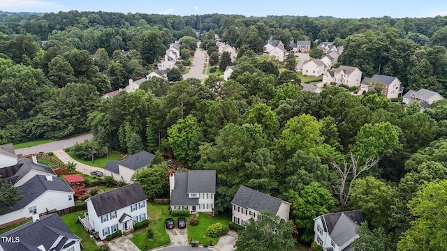 108 Tarlow Ct, Cary, NC 27513 - aerial perspective of suburban area featuring a heavily wooded area