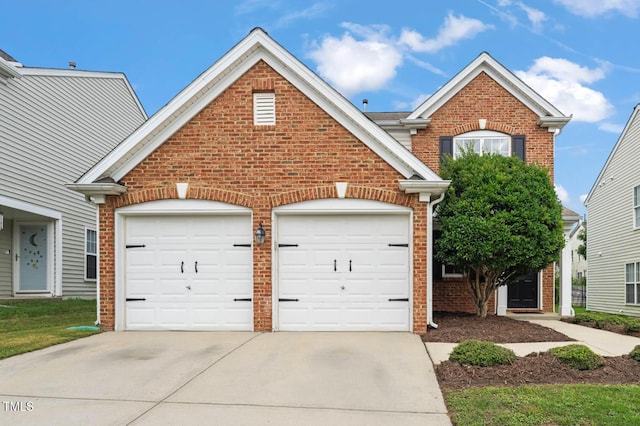 2127 Rivergrass Ct, Raleigh, NC 27610 - traditional home featuring brick siding, an attached garage, and driveway