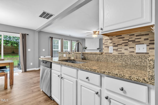 2127 Rivergrass Ct, Raleigh, NC 27610 - kitchen with dishwasher, white cabinetry, decorative backsplash, stone countertops, and light wood-type flooring