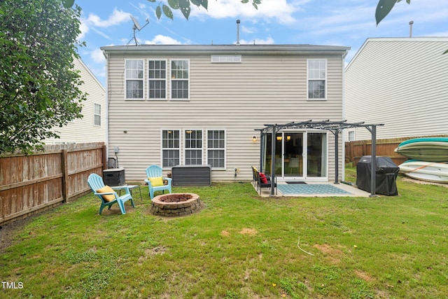 2127 Rivergrass Ct, Raleigh, NC 27610 - rear view of house with a fire pit, a pergola, and a patio area