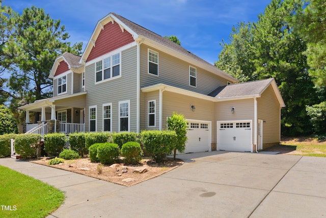80 Clubhouse Dr, Youngsville, NC 27596 - view of property exterior with covered porch, a garage, and driveway