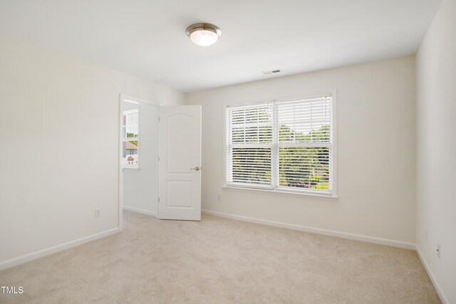80 Clubhouse Dr, Youngsville, NC 27596 - spare room with carpet floors and baseboards