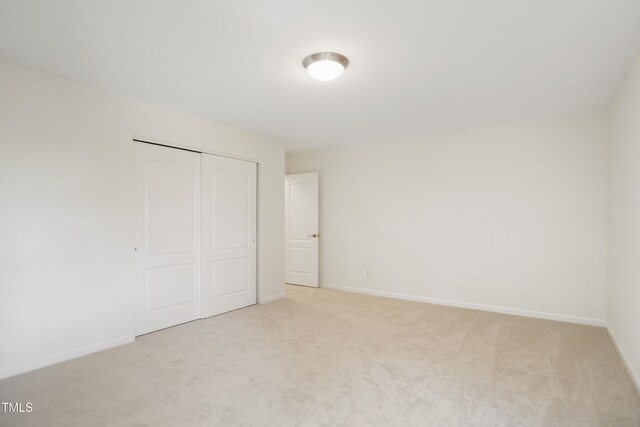 80 Clubhouse Dr, Youngsville, NC 27596 - unfurnished bedroom with carpet and a closet