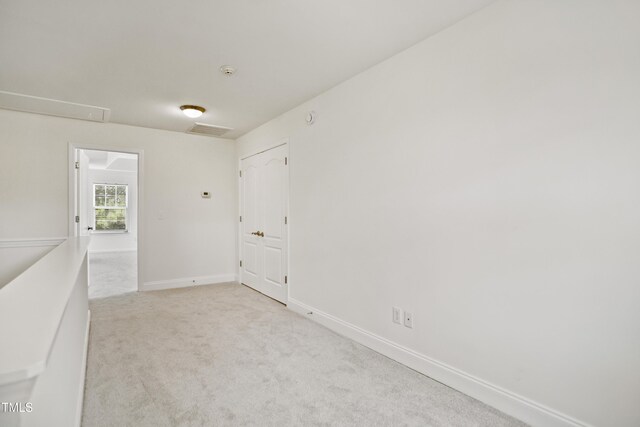80 Clubhouse Dr, Youngsville, NC 27596 - carpeted empty room with attic access and a smoke detector