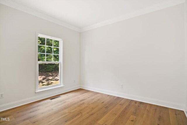 80 Clubhouse Dr, Youngsville, NC 27596 - unfurnished room with crown molding and light wood-style flooring