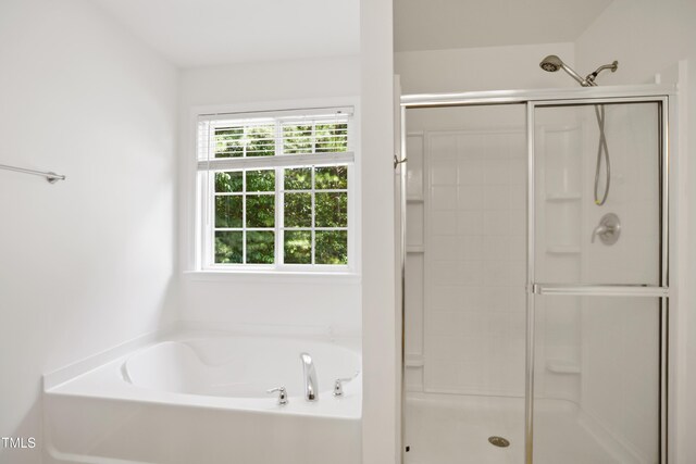 80 Clubhouse Dr, Youngsville, NC 27596 - full bath featuring a stall shower and a garden tub