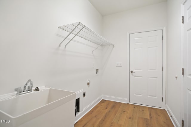 80 Clubhouse Dr, Youngsville, NC 27596 - laundry room featuring washer hookup, light wood-type flooring, and electric dryer hookup