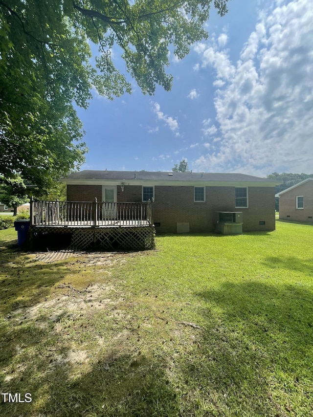 503 Indian Trl, Nashville, NC 27856 - back of house with a wooden deck and a yard