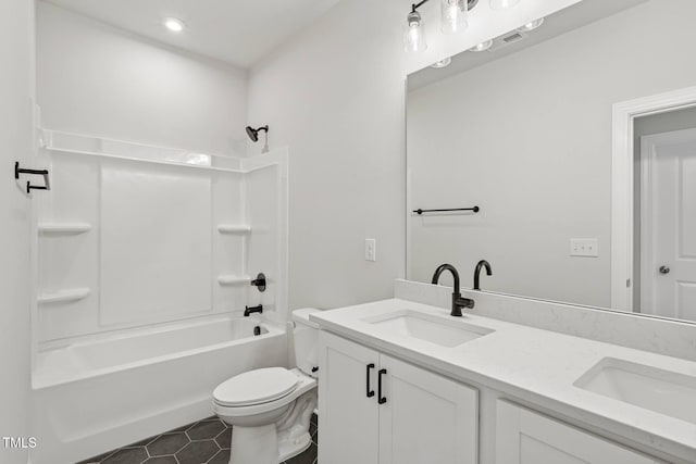4701 Mint Leaf Ln, Raleigh, NC 27612 - bathroom featuring double vanity, washtub / shower combination, tile patterned flooring, and recessed lighting