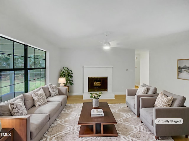 11 Sweetbay Ct, Durham, NC 27704 - living area featuring a ceiling fan, healthy amount of natural light, and light wood-style flooring