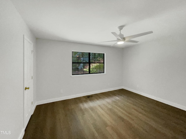 11 Sweetbay Ct, Durham, NC 27704 - unfurnished room featuring dark wood-style flooring and a ceiling fan