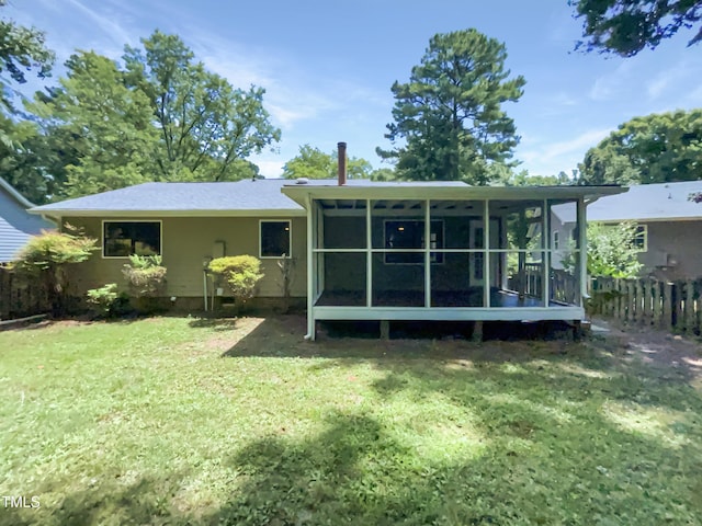 11 Sweetbay Ct, Durham, NC 27704 - rear view of property featuring a sunroom