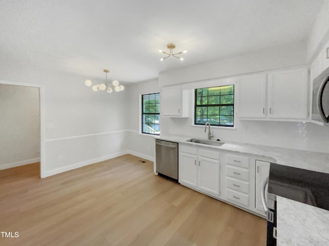11 Sweetbay Ct, Durham, NC 27704 - kitchen featuring stainless steel appliances, a chandelier, light wood-style flooring, white cabinetry, and pendant lighting