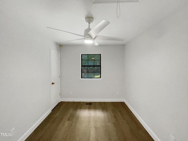 11 Sweetbay Ct, Durham, NC 27704 - empty room featuring dark wood-style floors and ceiling fan