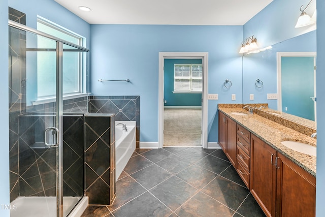 428 Holsten Bank Way, Cary, NC 27519 - full bathroom featuring double vanity, plenty of natural light, a garden tub, and tile patterned flooring
