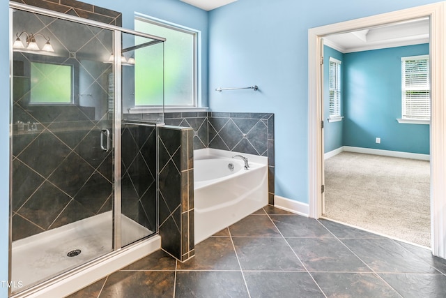 428 Holsten Bank Way, Cary, NC 27519 - bathroom featuring a bath, a shower stall, crown molding, and tile patterned floors