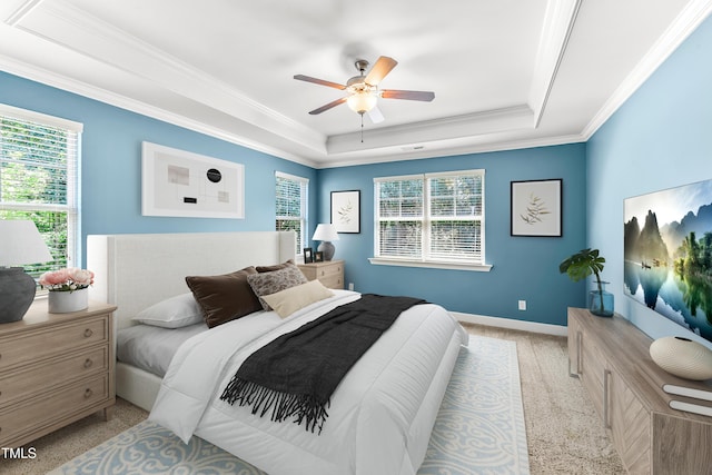 428 Holsten Bank Way, Cary, NC 27519 - bedroom featuring a raised ceiling, multiple windows, crown molding, carpet floors, and ceiling fan