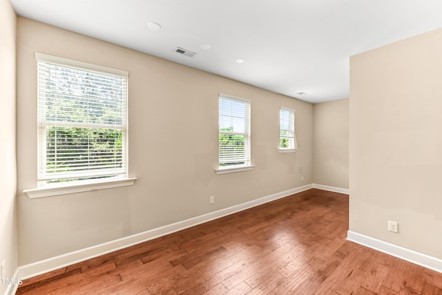 428 Holsten Bank Way, Cary, NC 27519 - spare room featuring wood finished floors and recessed lighting