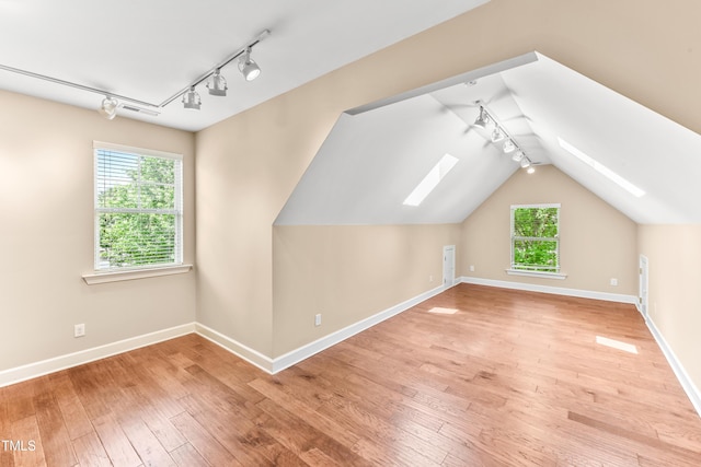 428 Holsten Bank Way, Cary, NC 27519 - bonus room featuring light wood-style floors, a skylight, and lofted ceiling