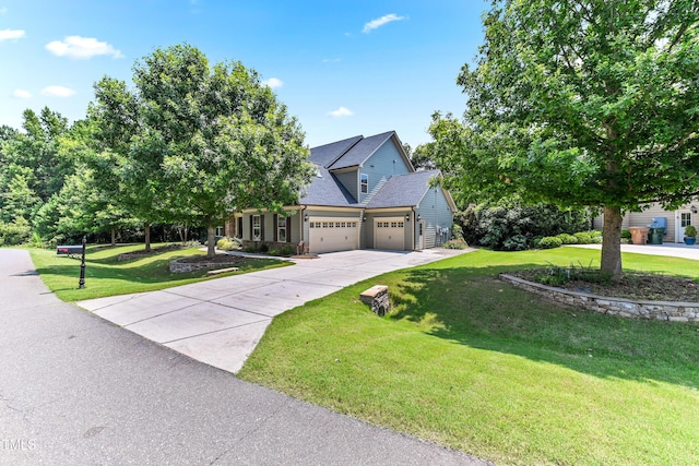 428 Holsten Bank Way, Cary, NC 27519 - view of front facade featuring an attached garage, a front lawn, driveway, and roof with shingles