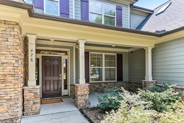 428 Holsten Bank Way, Cary, NC 27519 - entrance to property featuring stone siding and covered porch