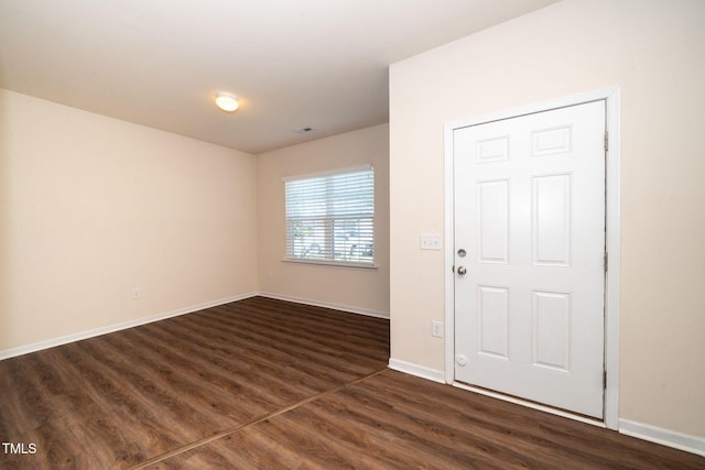 2522 Dalmahoy Ln, Fuquay Varina, NC 27526 - entryway featuring dark wood-type flooring and baseboards