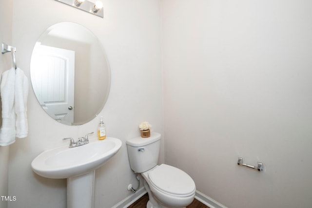 2522 Dalmahoy Ln, Fuquay Varina, NC 27526 - half bathroom with toilet and a sink