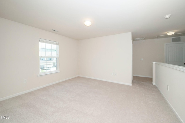 2522 Dalmahoy Ln, Fuquay Varina, NC 27526 - empty room with light colored carpet and a smoke detector