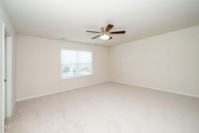 2522 Dalmahoy Ln, Fuquay Varina, NC 27526 - spare room with light colored carpet and ceiling fan