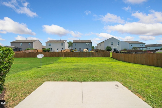 2522 Dalmahoy Ln, Fuquay Varina, NC 27526 - fenced backyard with a residential view and a patio area