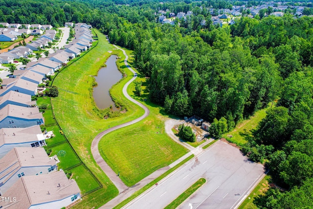 2522 Dalmahoy Ln, Fuquay Varina, NC 27526 - aerial view of residential area featuring a nearby body of water and a heavily wooded area