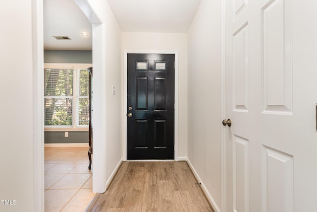 1520 Woodcroft Dr, Raleigh, NC 27609 - foyer entrance featuring baseboards and light wood-style floors