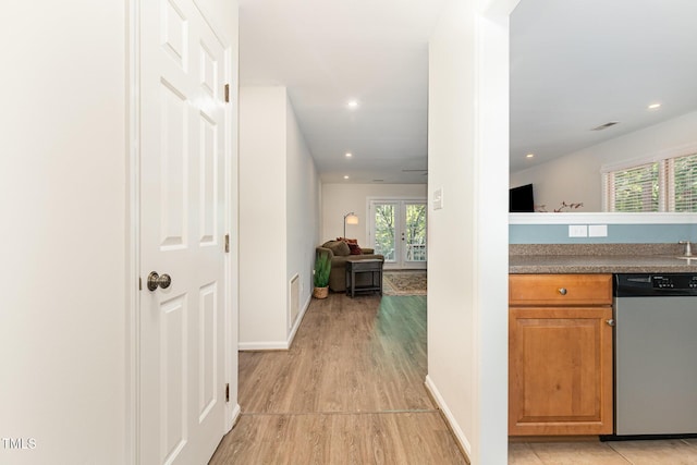 1520 Woodcroft Dr, Raleigh, NC 27609 - hall with light wood-style flooring and recessed lighting