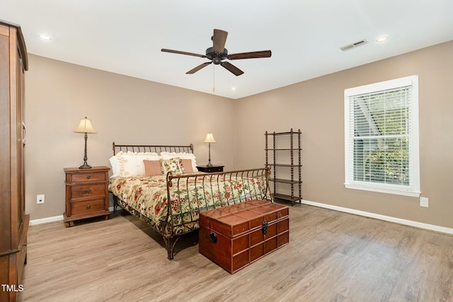 1520 Woodcroft Dr, Raleigh, NC 27609 - bedroom featuring light wood finished floors, recessed lighting, and a ceiling fan